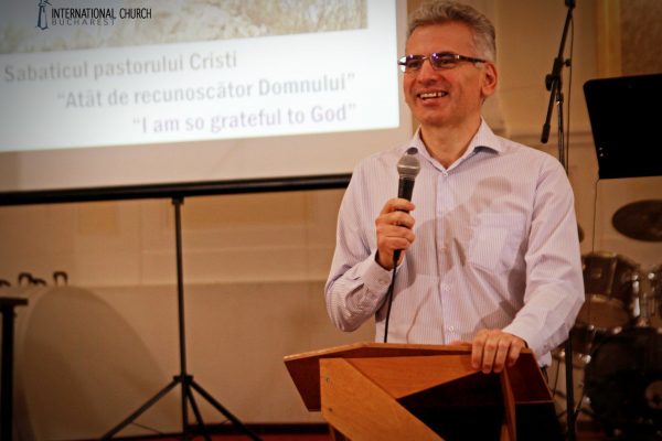 Pastor Cristi speaking at a meeting